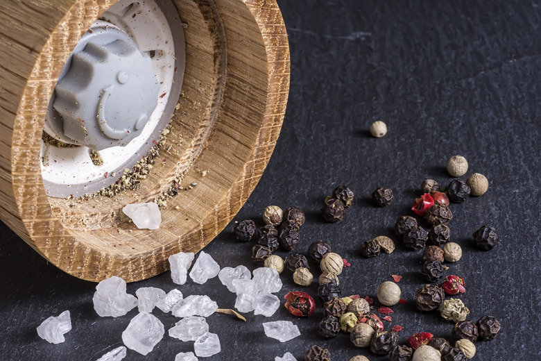 Pepper Grains, Sea Salt and Pepper Mill Background