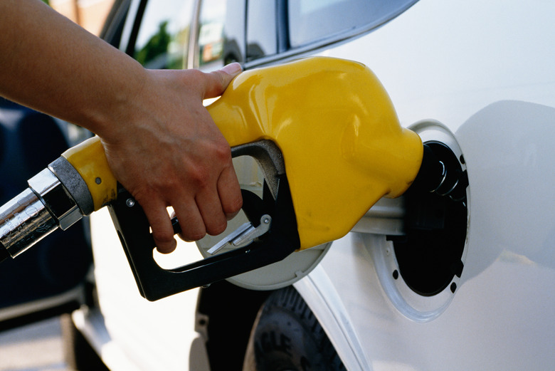 Person filling gas tank