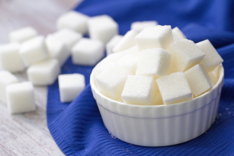 Sugar refined in white bowl