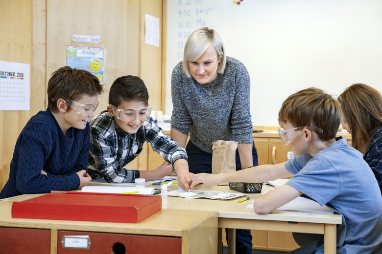 Children with teacher in classroom