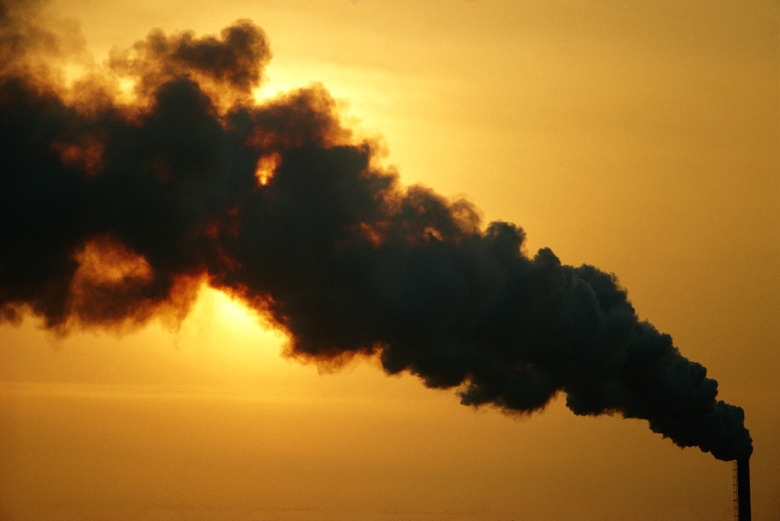 Smoke stack emitting from chimney