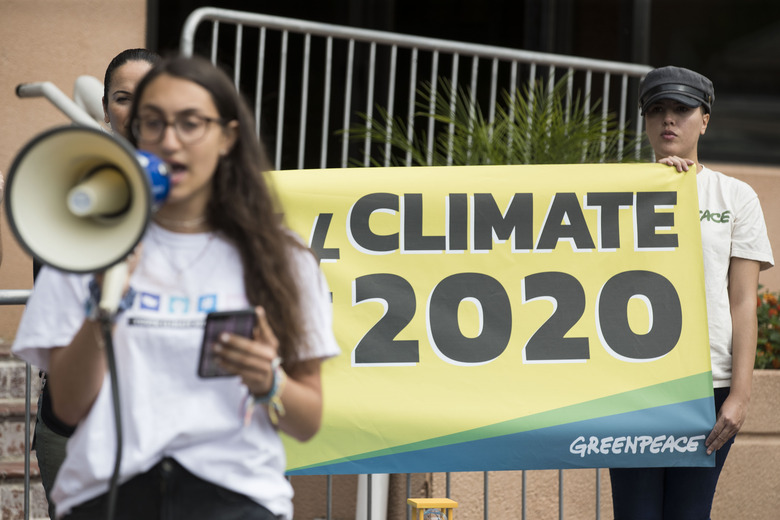 Greenpeace Protests Outside DNC Headquarters Urging The Party To Hold A Climate Change Debate