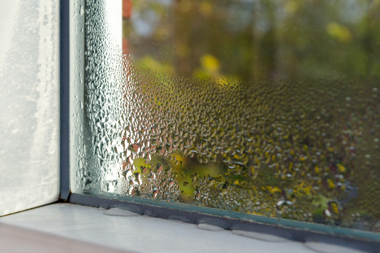 window with water drops closeup, inside, selective focus