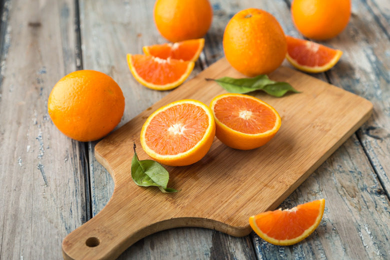 orange isolated on wood background