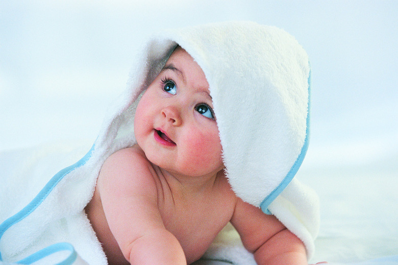 Baby Looking Up With a Towel Covering its Head