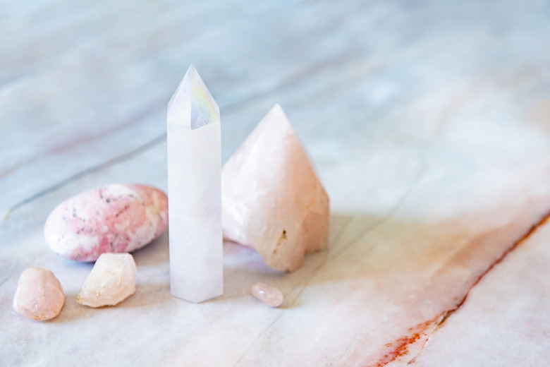 Rose and Angle Aura Quartz Crystals with Rhodonite Palm Stone