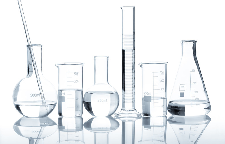 Group of laboratory flasks with a clear liquid