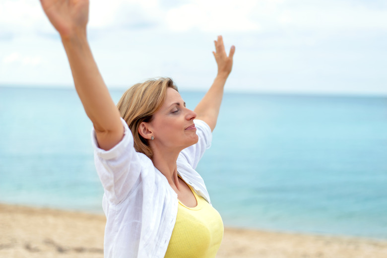 Happy mature woman at the seaside