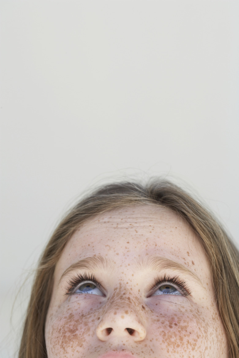 young girl looking up 