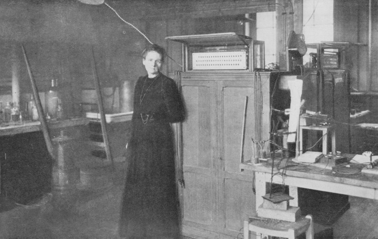 Marie Curie posing in her laboratory