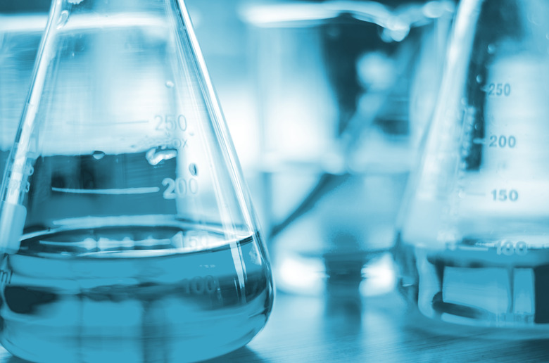 three erlenmeyer flask , Glassware on  science laboratory research and development