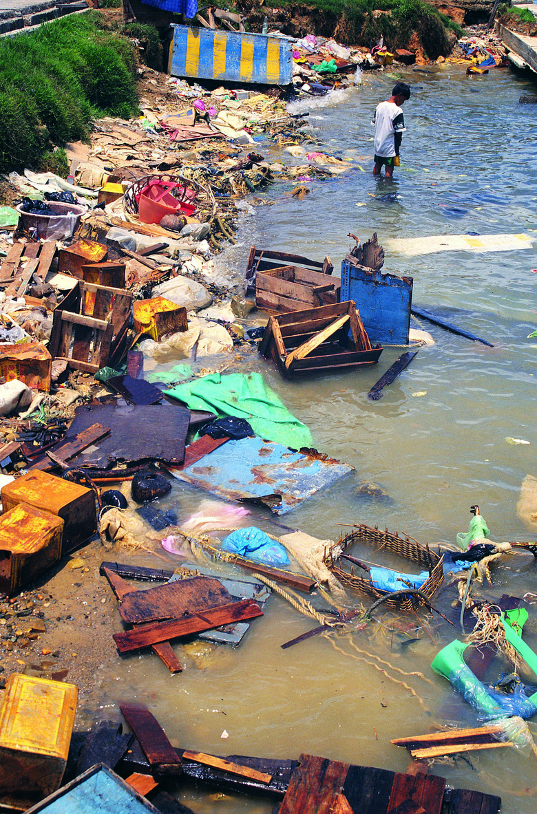 Market area with rubbish dumped in the sea,Borneo