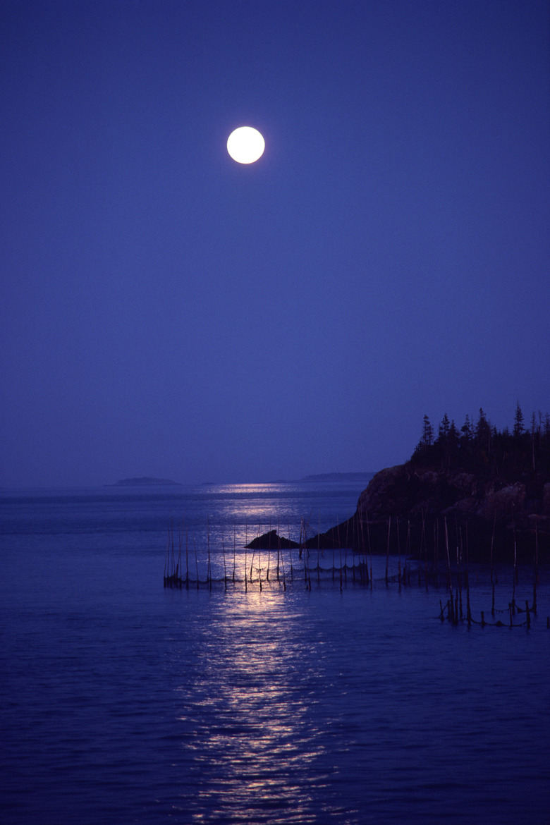 Silhouette of coastline at night