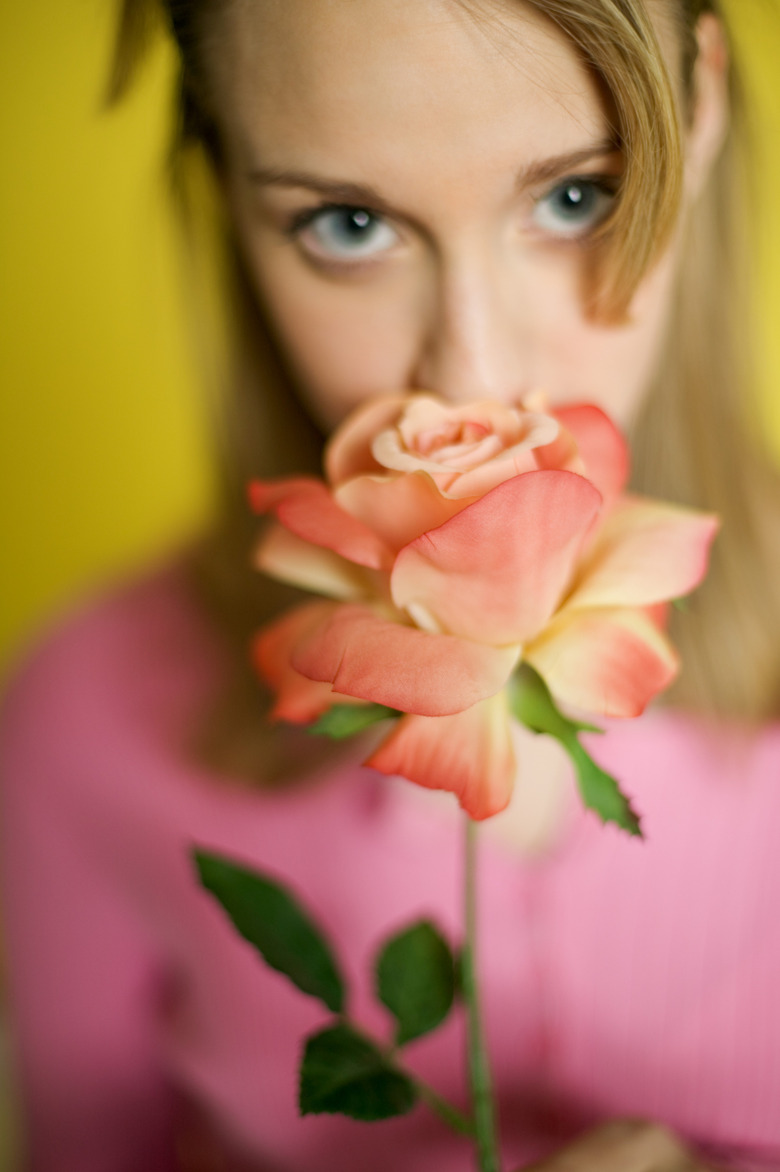 Woman holding rose