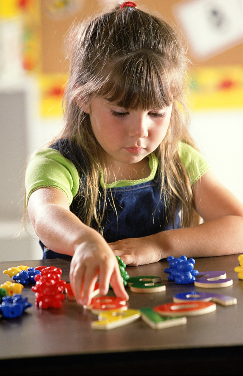 Girl with puzzle pieces