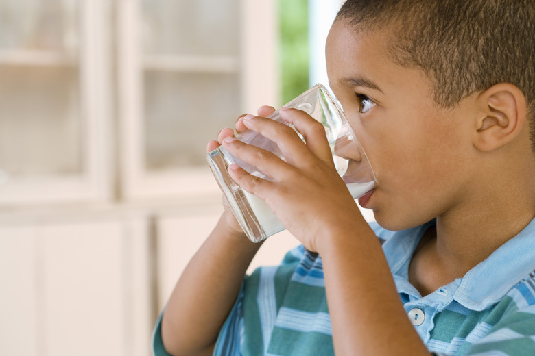 Boy drinking glass of milk