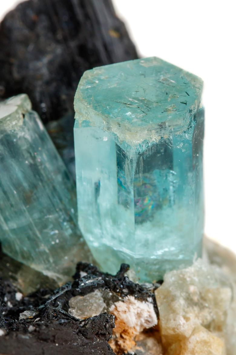 Macro mineral stone Aquamarine and black tourmaline, Schorl on a white background