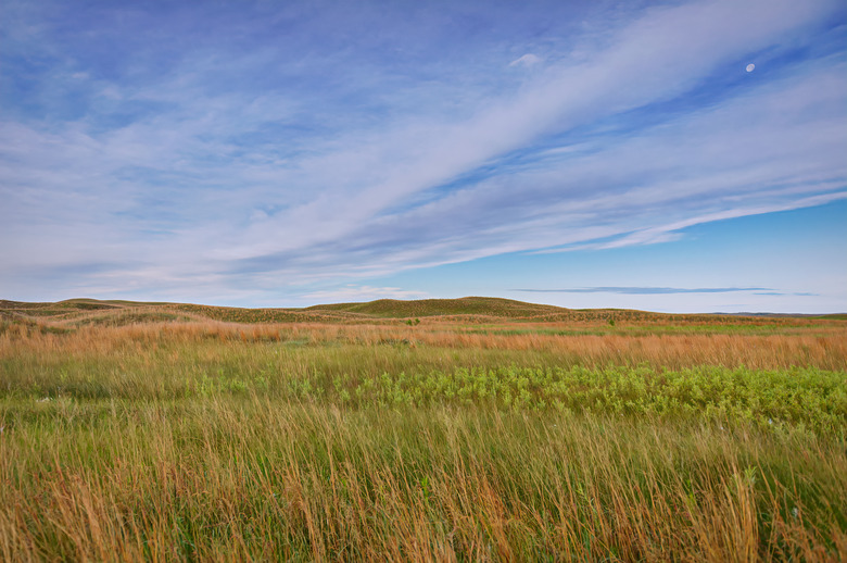 Clouds and Moon over Nebraska Sandhills north of Thedford, Nebraska in the early morning hours