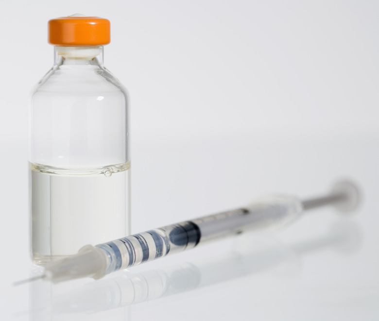 Syringe and insulin bottle