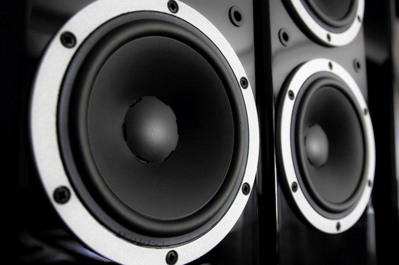 A close-up of matte black speakers