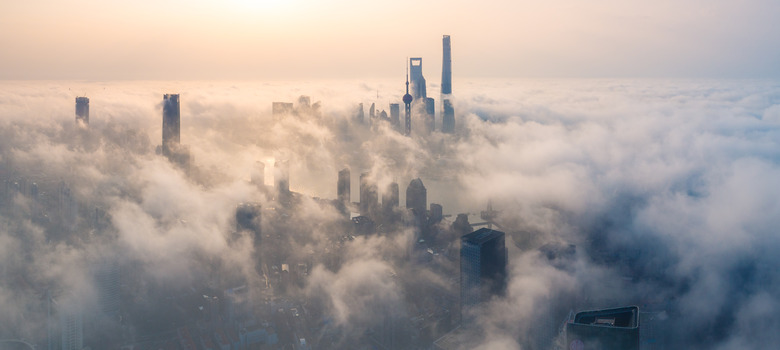 panoramic view of Shanghai city over the advection fog at sunrise