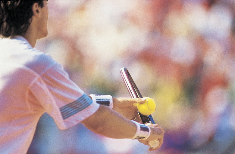 Tennis Player Preparing to Serve