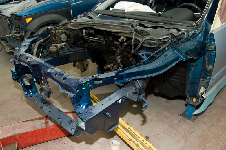 Car frame in automotive body shop