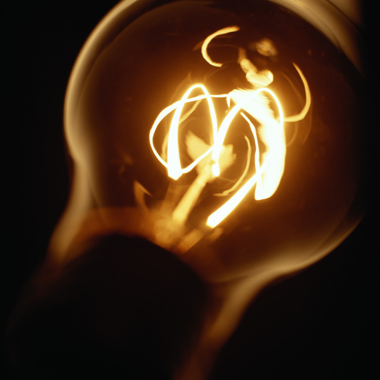 Glowing light bulb filament, close-up