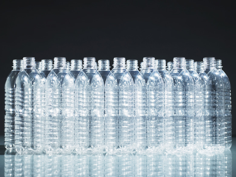 Row of empty plastic bottles