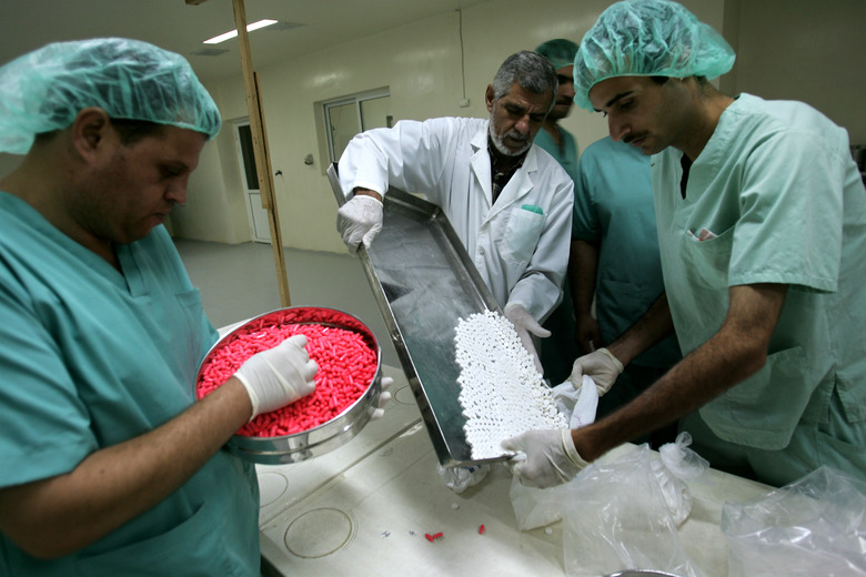 Workers in a pharmaceutical factory