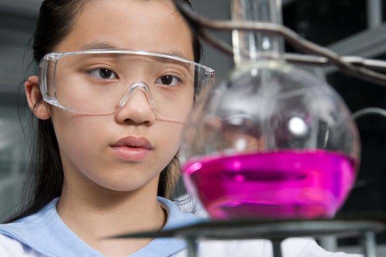 A girl doing a science experiment