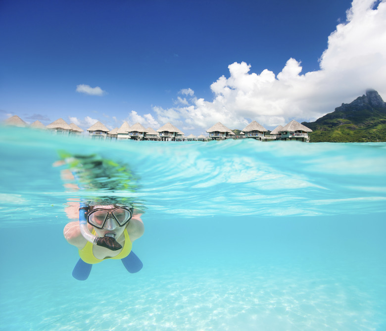 Woman snorkeling in a tropical lagoon