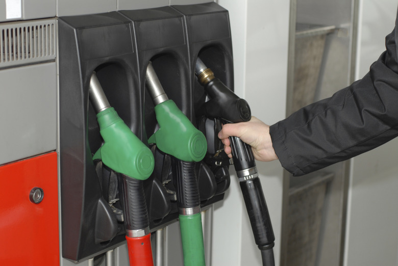 Three gas pump nozzles