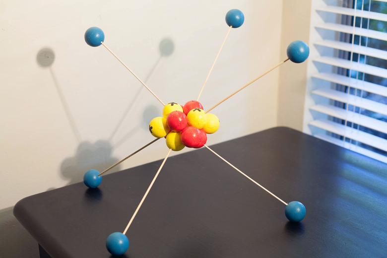 A 3D model of an atom on a table