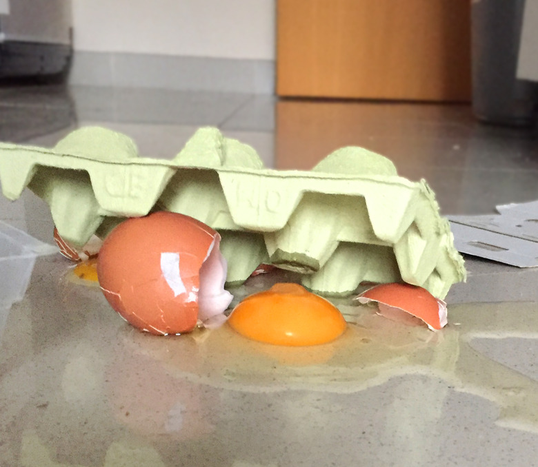 Broken eggs on the kitchen floor