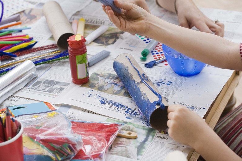 Hands of child doing crafts