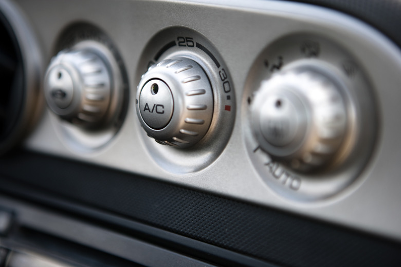 Knobs and controls on dashboard of automobile