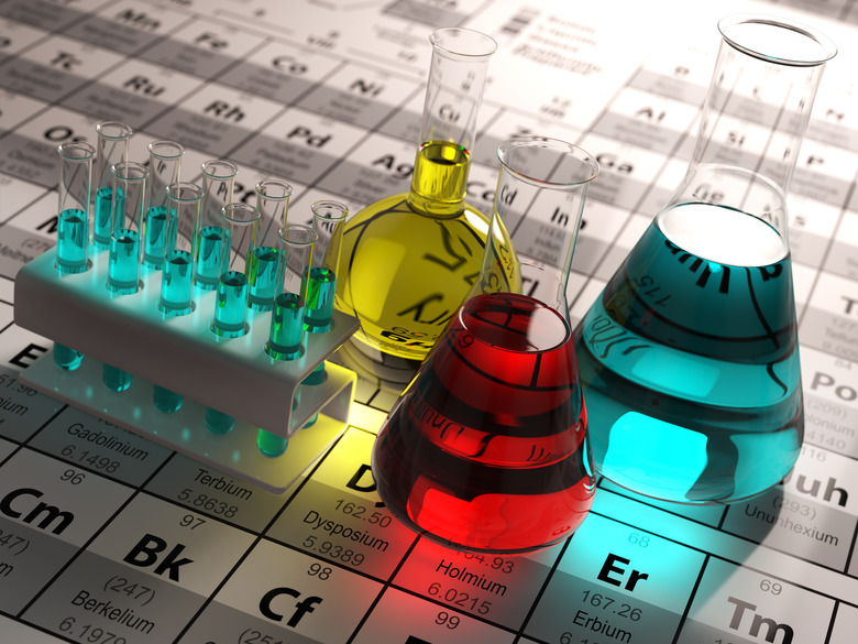 Laboratory test tubes and flasks with colored liquids