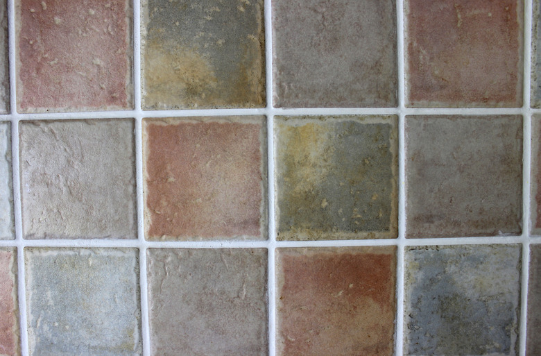 Image of rustic square kitchen tiles in brown, grey, orange