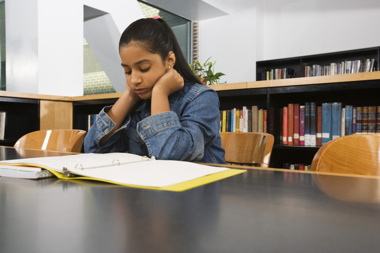 Girl studying in library