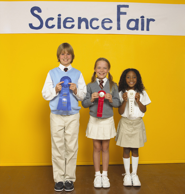 Students with science fair prizes