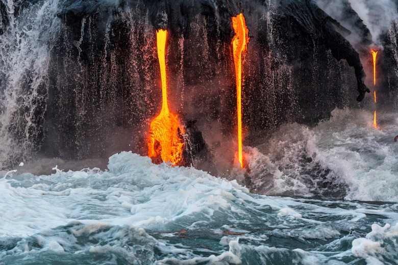 Molten lava flowing into the Pacific Ocean on Big Island