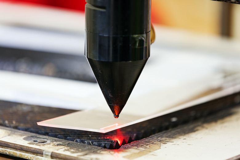 Red laser on cutting machine