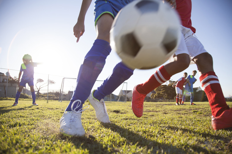 Boys playing in a soccer match