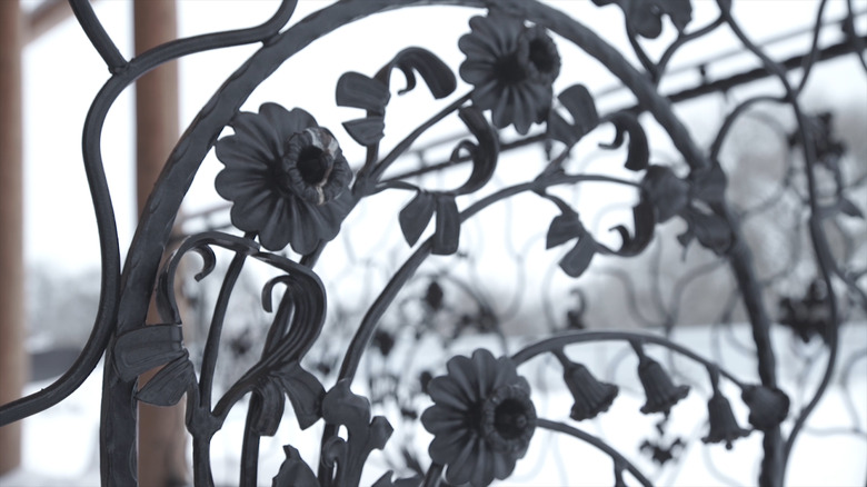 Art forging elements and iron fence. Rough Metal Curly Decorative Elements . Vintage decor Elements. Fence Design. Vintage. Beautiful Fence Design Closeup. Iron