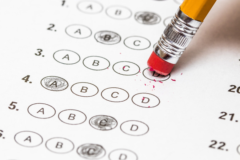 Standardized quiz or test score sheet with multiple choice answers pencil, and eraser.