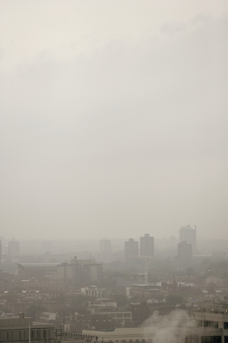 England, London, cityscape on foggy day