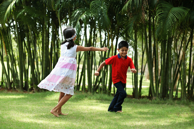 View of two children playing in a park