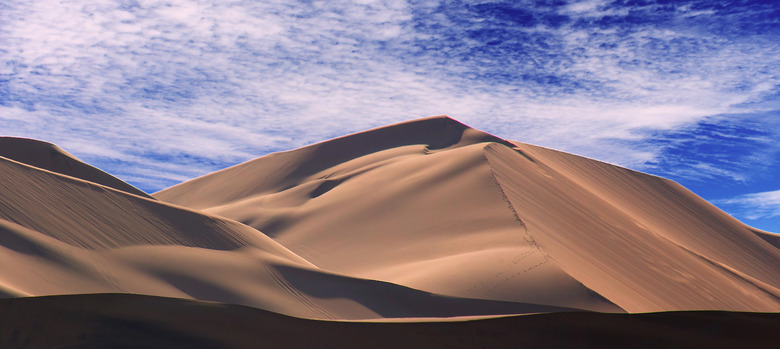 Golden sand dune 7 and white clouds on a sunny day