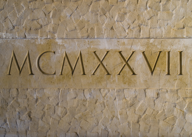 Roman numerals engraved in textured stone